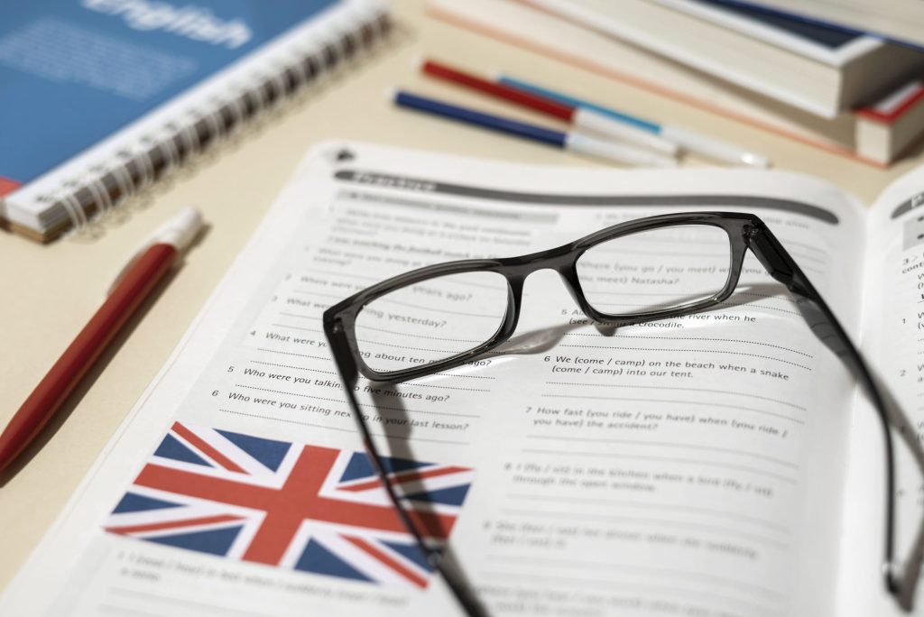 english-book-with-glasses-table